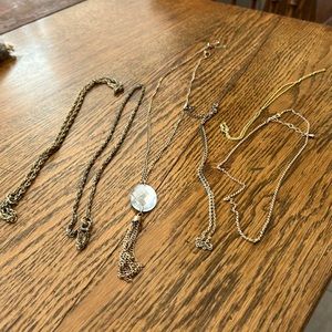 Fax gold colored six bundle of necklaces